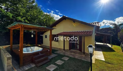 Casa com 3 dormitórios à venda, 174 m² por R$ 1.100.000,00 - Condomínio Residencial Granja Virginia - Guararema/SP