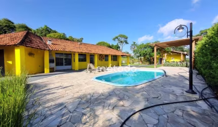 Chácara com 4 dormitórios à venda, 8760 m² por R$ 2.200.000 - Parque Agrinco - Guararema/SP