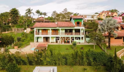 Casa com 4 dormitórios à venda, 398 m² por R$ 2.200.000 - Condomínio Residencial Alpes de Guararema - Guararema/SP