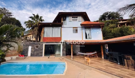Casa com 4 dormitórios à venda, 496 m² por R$ 1.950.000,00 - Condomínio Residencial Alpes de Guararema - Guararema/SP