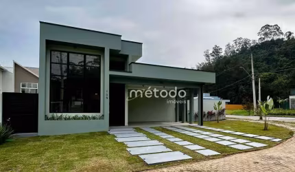 Casa com 3 dormitórios à venda, 185 m² por R$ 1.800.000 - Condomínio Residencial Terras da Freguesia - Guararema/SP