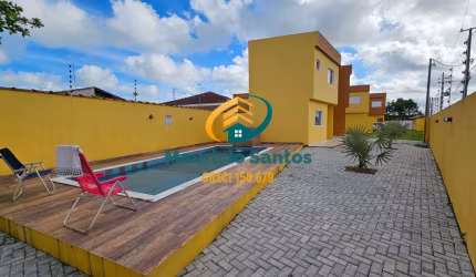 Sobrado em Condomínio em Itanhaém, bairro Santa Terezinha, próximo a praia, 2 suítes, lavabo, lavanderia e churrasqueira, Residencial com piscina com cascata!!