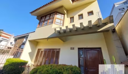 Casa com 4 dormitórios para alugar, 290 m² por R$ 7.540,00/mês - Camaquã - Porto Alegre/RS