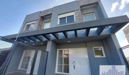Casa com 3 dormitórios para alugar, 125 m² por R$ 2.870,00/mês - Guarujá - Porto Alegre/RS