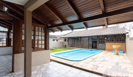 Casa com 4 dormitórios para alugar, 257 m² por R$ 7.400,00/mês - Guarujá - Porto Alegre/RS