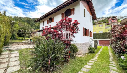 Casa com 4 dormitórios à venda, 187 m² por R$ 940.000,00 - Golfe - Teresópolis/RJ