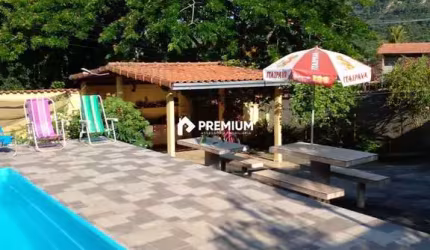 CASA COM PISCINA, LOTE DE 450M2, PRÓXIMO A RODOVIA - 450 MIL!