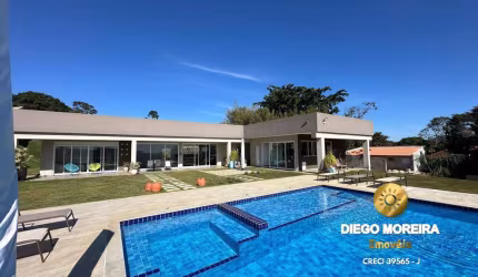 Casa térrea com vista para represa em condomínio de Piracaia - SP