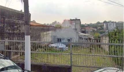Terreno com casa e sobrado para investidores zona sul