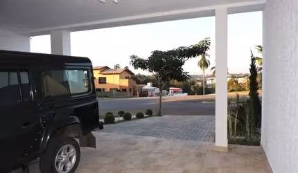 Casa no condomínio vintage com 03 suítes, 4 vagas, sala com 3 ambientes, sala de TV com varanda