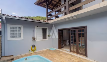 Casa em condomínio fechado com 3 quartos à venda na Rua Itajubá, --, Bom Retiro, Joinville por R$ 660.000