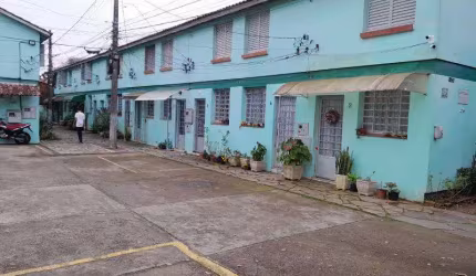 SOBRADO, com 2 dormitórios , sala, cozinha , área de serviços, banheiro e estacionamento rotativo