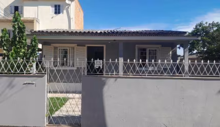 Terreno com 338 m² , com 4 casas de alvenaria