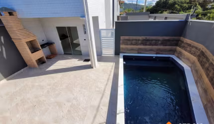 SOBRADO EM CONDOMÍNIO FECHADO FRENTE AO MAR COM PISCINA INDIVIDUAL - 80M²!