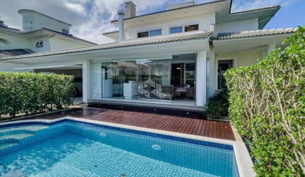 Casa em condomínio fechado com 3 quartos à venda na Rodovia Haroldo Soares Glavan, 929, Cacupé, Florianópolis por R$ 4.490.000