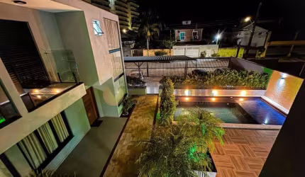 Sobrado com 3 dormitórios à venda, 111 m²  Cidade Jardim - Caraguatatuba/SP