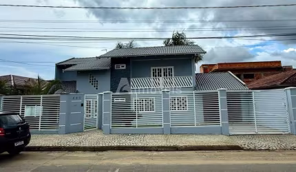 Sobrado Sofisticado em Nova Brasília – Exclusividade, Espaço e Lazer Completo por R$ 950 Mil!