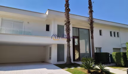 CASA DE CONDOMINIO - 4 SUITES - 6 VAGAS