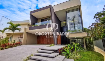 Casa À Venda com 460m² de área construída, 5 suítes, em Riviera de São Lourenço Bertioga SP.