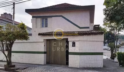 Casa com 3 dormitórios à venda, 140 m² por R$ 500.000,00 - Vila Cascatinha - São Vicente/SP