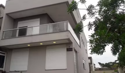 Casa em condomínio fechado com 3 quartos à venda na Rua Silvino Nedel, 240, Alto Petrópolis, Porto Alegre por R$ 719.000