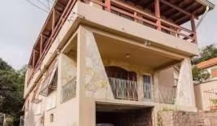 Casa com 4 quartos à venda na Estrada dos Alpes, 242, Teresópolis, Porto Alegre, 264 m2 por R$ 449.000