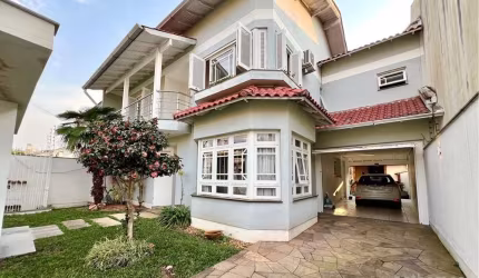 Casa com 4 quartos à venda na Rua Suíça, 170, Moinhos De Vento, Canoas, 243 m2 por R$ 1.149.000