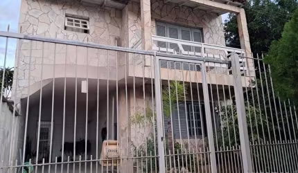Casa com 3 quartos à venda na Rua Integração, 52, Jardim Algarve, Alvorada, 215 m2 por R$ 460.000