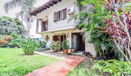 Casa em condomínio fechado com 4 quartos à venda na Acesso das Orquídeas, 93, Santa Tereza, Porto Alegre, 231 m2 por R$ 520.000