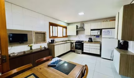 Casa em condomínio fechado com 3 quartos à venda na Rua Deputado Hugo Mardini, 1780, Passo das Pedras, Porto Alegre, 140 m2 por R$ 678.000