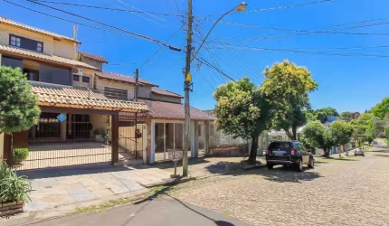 Casa com 3 quartos à venda na Rua Doutor Egydio Michaelsen, 62, Cavalhada, Porto Alegre, 198 m2 por R$ 680.000