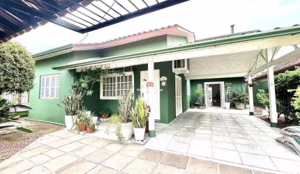 Casa com 262m² | suíte com lareira | 4 dormitórios no bairro Bela Vista em Estância Velha.