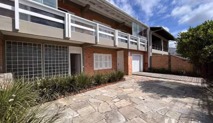 Sobrado com 4 dormitórios para alugar, 325 m² por R$ 6.264,18/mês - Meia Praia - Navegantes/SC