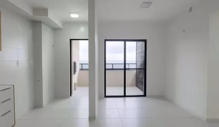 APARTAMENTO COM TRÊS DORMITÓRIOS EM PENHA COM VISTA PARA O MAR