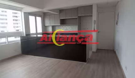 Apartamanto Lindo na vila milton Com sacada piscina e salão de jogos e churrasqueira .