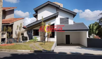 Casa condomínio arujá 5 com 3 dormitórios sendo 1 suíte, 3 salas e 6 vagas - Arujá