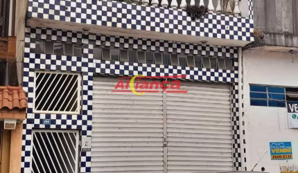 sobrado com salão comercial no térreo