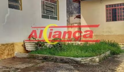 Casa com 2 casas no mesmo terreno antigas à venda na Ponte Grande