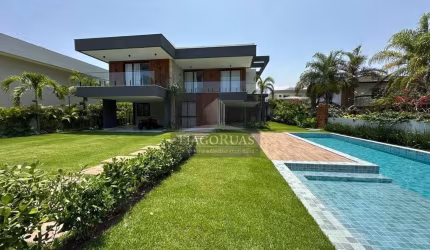 Aluguel Luxuosa Casa de 5 Suítes no Condomínio Busca Ville, : Fino Acabamento e Alto Padrão - Imperdível!