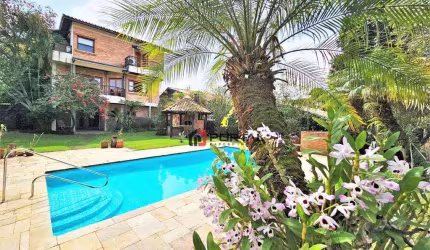 Casa com 4 dormitórios à venda, 403 m² por R$ 1.600.000,00 - Granja Viana - Jandira/SP