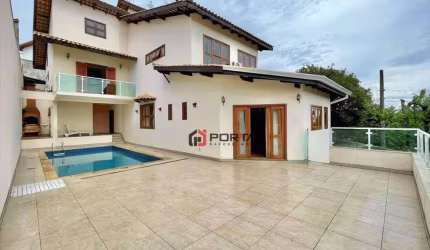 Casa com 4 dormitórios à venda, 357 m² por R$ 1.430.000,00 - Granja Viana - Carapicuíba/SP