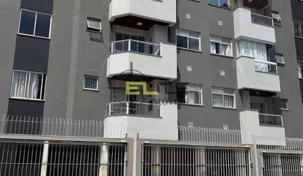 Apartamento de 2 dormitórios, SEMI-MOBILIADO com sacada e Churrasqueira em Nossa Sra. do Rosário/Sã