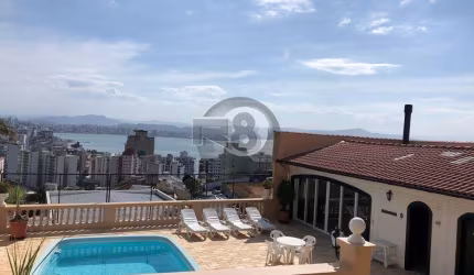 Casa alto padrão + piscina e vista mar permanente
