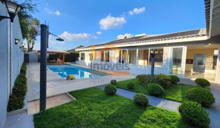 Casa de Luxo no Condomínio Vale das Paineiras em Americana-SP: 4 quartos, 4 suítes, 3 salas, 5 banheiros, 4 vagas, 590m². Venda!