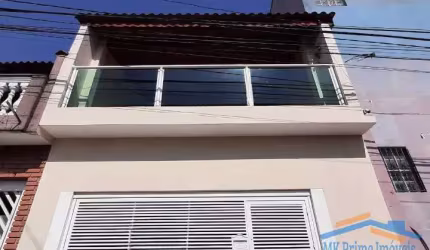 Excelente Casa Assobradada com 2 Dormitórios e 2 Vagas de Garagem.