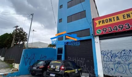 Prédio Comercial de 4 Andares com Salas Amplas e Vagas de Garagem.