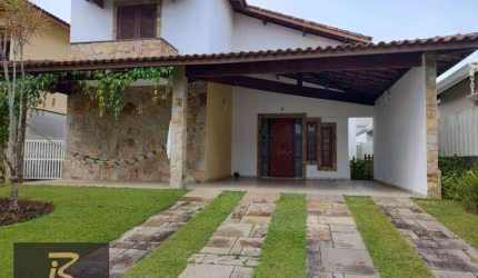 Casa com 3 dormitórios para alugar, 160 m² por R$ 4.300,00/mês - Bougainvillee III - Peruíbe/SP