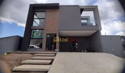 Sobrado com 4 dormitórios, 210 m² - venda por R$ 1.800.000,00 ou aluguel por R$ 8.580,00/mês - Condomínio Reserva Aruanã - São José dos Campos/SP