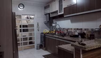 Casa com 2 dormitórios à venda, 76 m² por R$ 318.000,00 - Village das Flores - Caçapava/SP