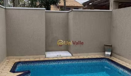 Casa com 3 dormitórios à venda, 150 m² por R$ 745.000 - Condomínio Hípica Pinheiro - Taubaté/SP
